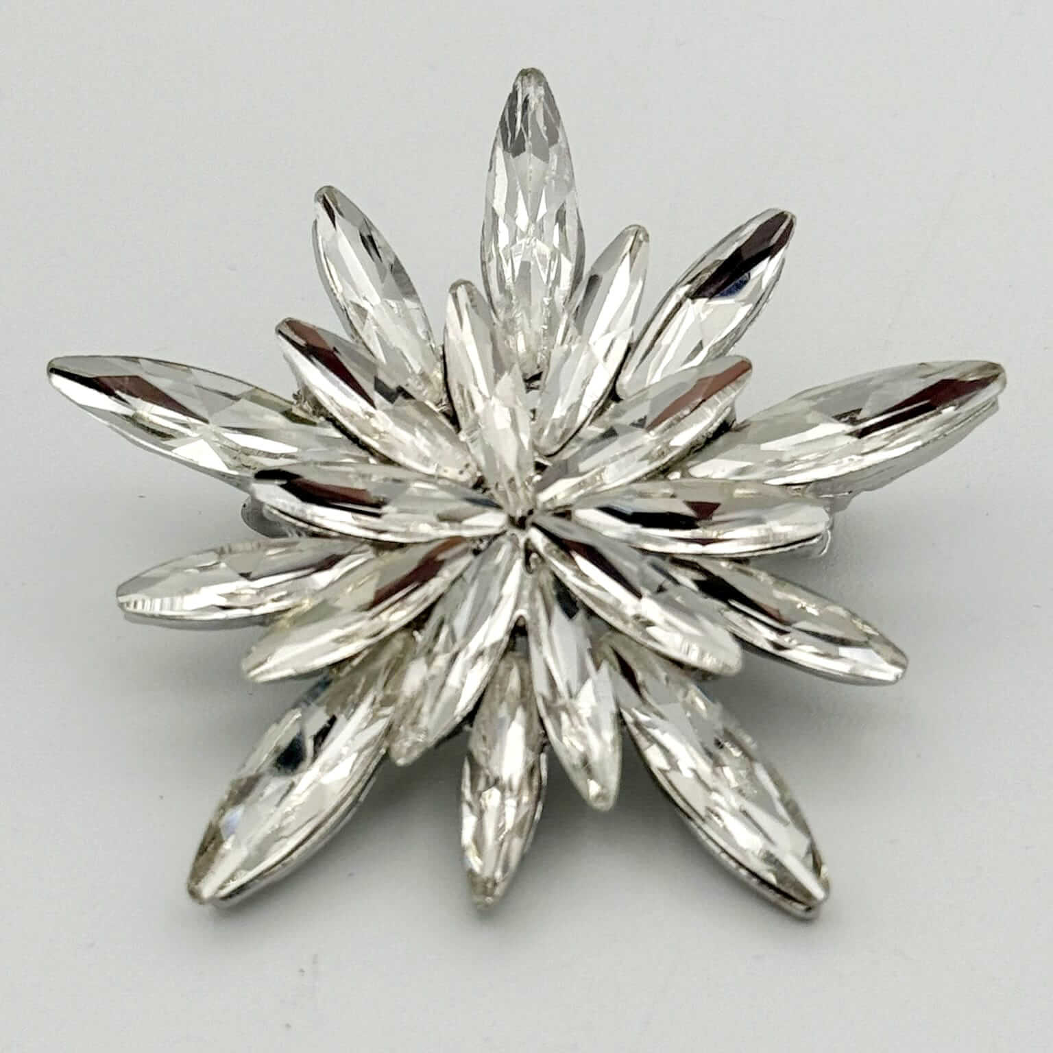 Sparkling Crystal Starburst Brooch